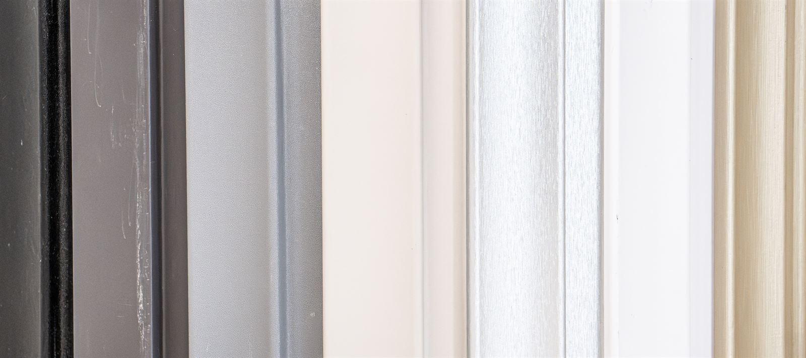 Row of samples in neutral tones, from black to white